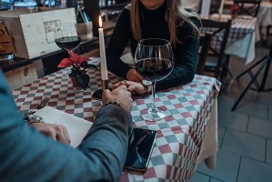 Romantic wine dinner by a couple